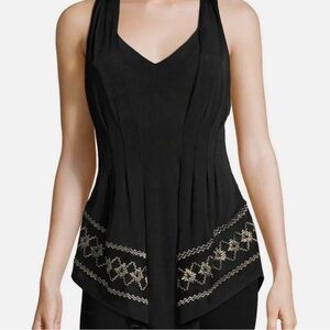 Free people. All eyes on Me embroidered top. Black and gold size small.